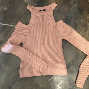 Sweater with cut outs